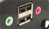 <b>Puertos frontales</b><br>Con fácil acceso a los puertos en el panel frontal: dispone de puertos de audio así como de 2 puertos USB